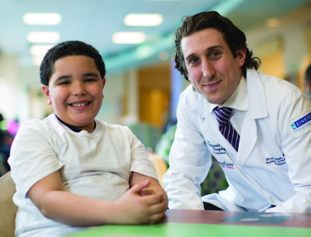 Dr. Rudolph with a pediatric patient.
