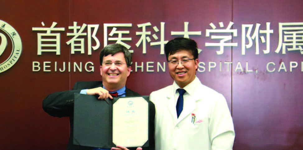 Matthew Bartels, MD, with Zhou Yujie, MD, Vice President, Capital Medical