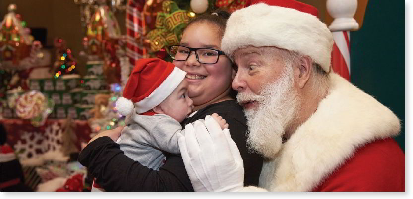 Santa grabs baby's attention
